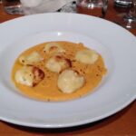 Gnudi with Smoked Ricotta, Peaches and Pistachios